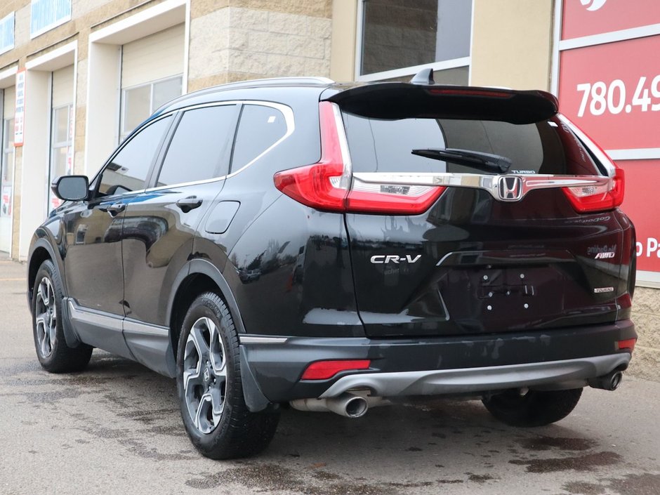 2018 Honda CR-V TOURING IN BLACK EQUIPPED WITH A 1.5L TURBO I4 , AWD , CVW AUTO , LEATHER HEATED SEATS , PREMIUM AUDIO , BACKUP CAM , DUAL ZONE-7