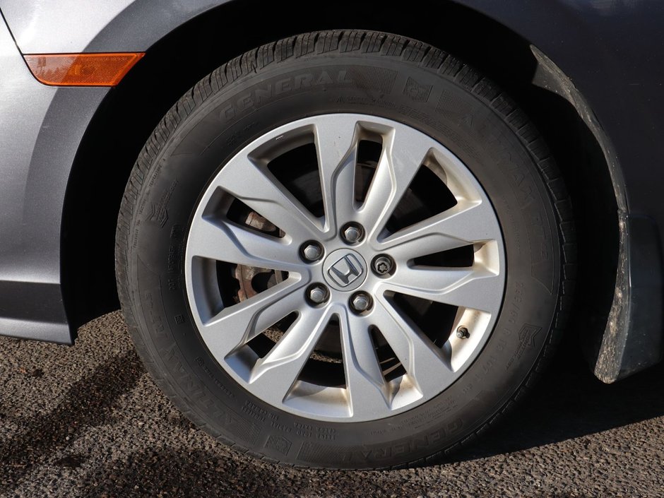 2018 Honda Odyssey LX IN GREY EQUIPPED WITH A 3.5L V6 , FWD , 9SPD AUTO , CLOTH HEATED SEATS , AC , CRUISE , PWR WINDOWS/LOCKS , HONDA RELIABILITY-4