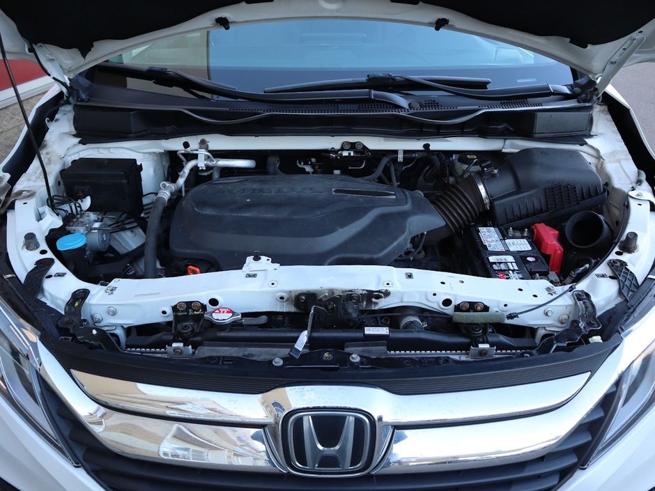 2019 Honda Odyssey EX IN WHITE EQUIPPEDW WITH A 280 HP 3.5L V6 , FWD , 9SPD AUTO , CLOTH HEATED SEATS , BACAKUP CAM , DUAL ZONE AC , CRUISE , 18INC-25