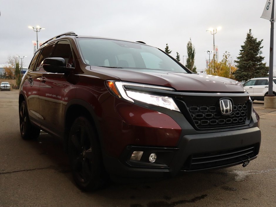 2020 Honda Passport TOURING IN RED EQUIPPED WITH A 3.5L V6 , AWD , 9SPD AUTO , LEATHER HEATED/VENTED BUCKET SEATS , DUAL EXHAUST , NAV , PREMIUM AUD-11