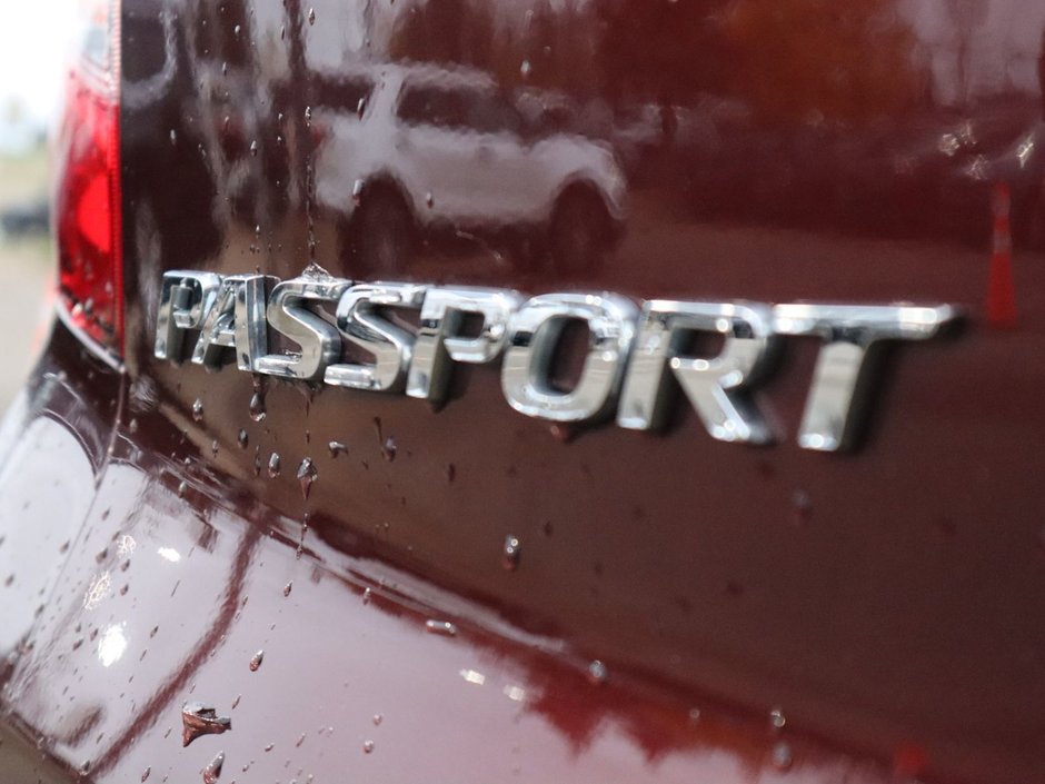 2020 Honda Passport TOURING IN RED EQUIPPED WITH A 3.5L V6 , AWD , 9SPD AUTO , LEATHER HEATED/VENTED BUCKET SEATS , DUAL EXHAUST , NAV , PREMIUM AUD-13