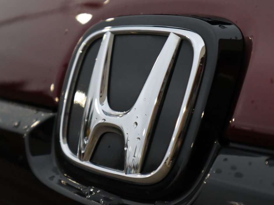 2020 Honda Passport TOURING IN RED EQUIPPED WITH A 3.5L V6 , AWD , 9SPD AUTO , LEATHER HEATED/VENTED BUCKET SEATS , DUAL EXHAUST , NAV , PREMIUM AUD-12