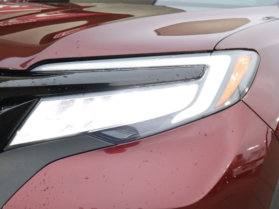 2020 Honda Passport TOURING IN RED EQUIPPED WITH A 3.5L V6 , AWD , 9SPD AUTO , LEATHER HEATED/VENTED BUCKET SEATS , DUAL EXHAUST , NAV , PREMIUM AUD-3