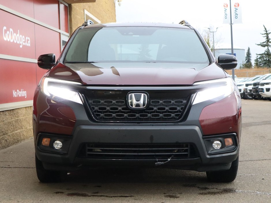 2020 Honda Passport TOURING IN RED EQUIPPED WITH A 3.5L V6 , AWD , 9SPD AUTO , LEATHER HEATED/VENTED BUCKET SEATS , DUAL EXHAUST , NAV , PREMIUM AUD-1