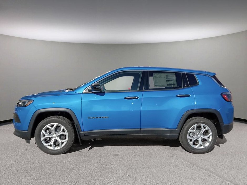 2024 Jeep Compass SPORT IN LASER BLUE PEARL EQUIPPED WITH A 2.0L TURBO I4 , 4X4 , 8SPD AUTO , 10.1INCH TOUCHSCREEN , AC , CRUISE , HEATED SEATS +-2