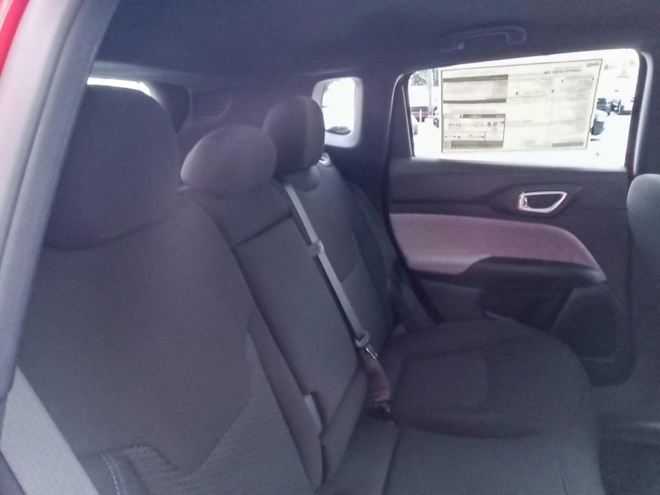 2025 Jeep Compass SPORT IN RED HOT PEARL EQUIPPED WITH A 2.0L TURBO I4 , 4X4 , 8SPD AUTO , TERRAIN MGMT , FCW , ACTIVE LANE MGMT , BACKUP CAM , AU-22