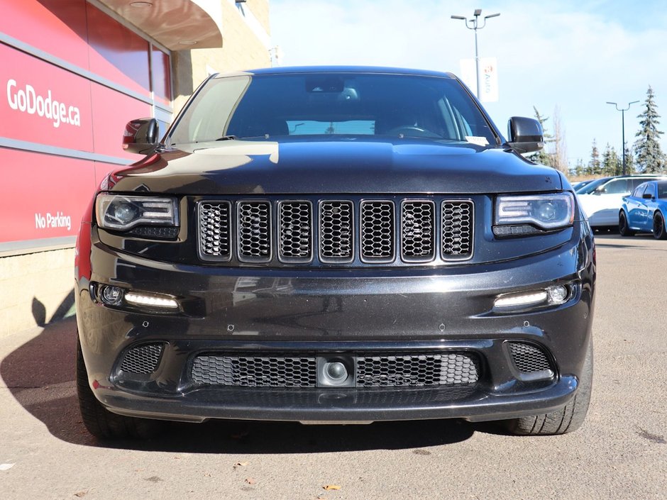 2016 Jeep Grand Cherokee SRT IN BRILLIANT BLACK EQUIPPED WITH A 6.4L SRT V8 , 4X4 , 8SPD TF AUTO , PANORAMIC SUNROOF , 19 SPEAKER HK AUDIO , 20INCH RIMS-1