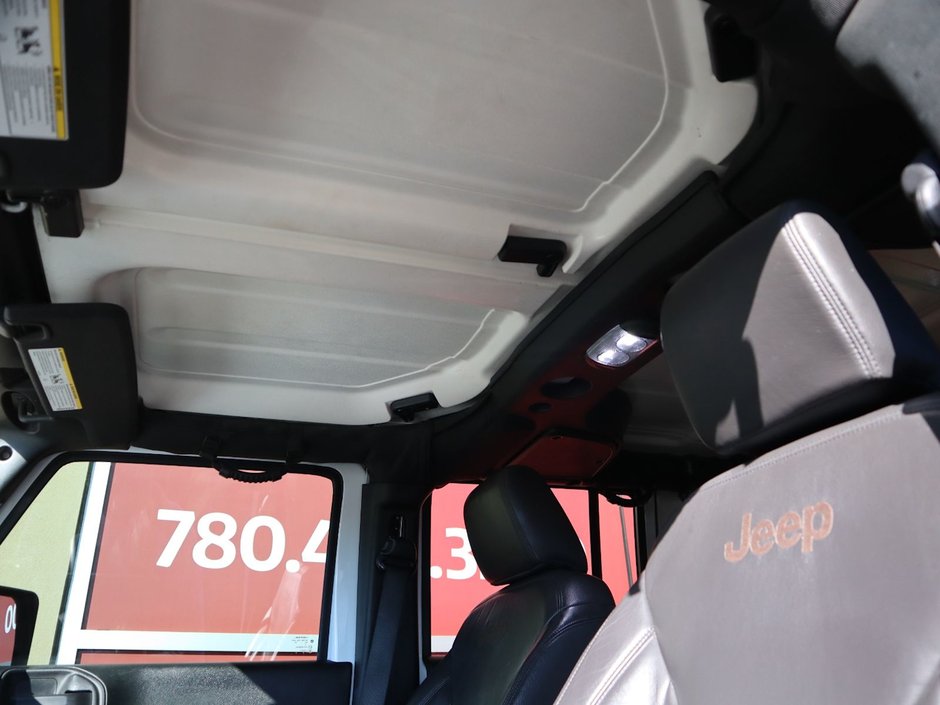 2018 Jeep WRANGLER JK UNLIMITED UNLIMITED SAHARA IN BRIGHT WHITE EQUIPPED WITH A 3.6L V6 , 4X4 , 5SPD AUTO , 18INCH RIMS , REMOTE START , NAV , ANTI SPIN DIFF ,-17