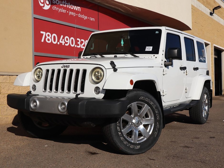 2018 Jeep WRANGLER JK UNLIMITED UNLIMITED SAHARA IN BRIGHT WHITE EQUIPPED WITH A 3.6L V6 , 4X4 , 5SPD AUTO , 18INCH RIMS , REMOTE START , NAV , ANTI SPIN DIFF ,-0