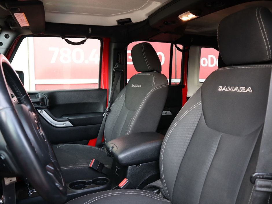 2018 Jeep WRANGLER JK UNLIMITED UNLIMITED SAHARA IN FIRECRACKER RED EQUIPPED WITH A 3.6L V6 , 4X4 , 5SPD AUTO , REMOTE START , AC , HEATED FRONT SEATS , NAV , C-16