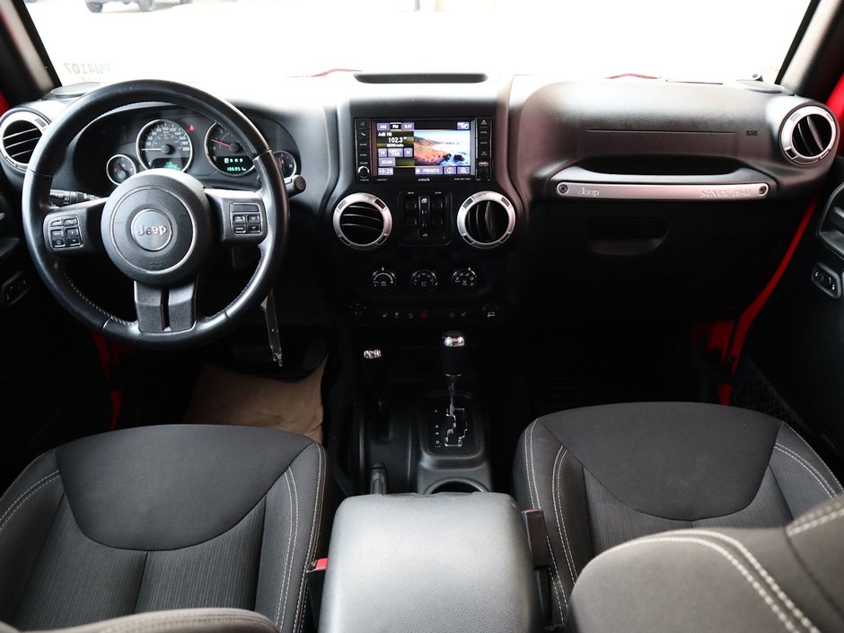 2018 Jeep WRANGLER JK UNLIMITED UNLIMITED SAHARA IN FIRECRACKER RED EQUIPPED WITH A 3.6L V6 , 4X4 , 5SPD AUTO , REMOTE START , AC , HEATED FRONT SEATS , NAV , C-23