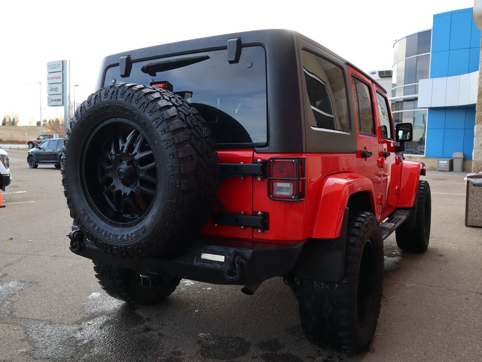 2018 Jeep WRANGLER JK UNLIMITED UNLIMITED SAHARA IN FIRECRACKER RED EQUIPPED WITH A 3.6L V6 , 4X4 , 5SPD AUTO , REMOTE START , AC , HEATED FRONT SEATS , NAV , C-9