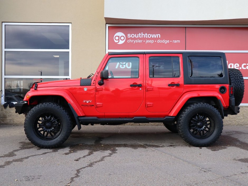 2018 Jeep WRANGLER JK UNLIMITED UNLIMITED SAHARA IN FIRECRACKER RED EQUIPPED WITH A 3.6L V6 , 4X4 , 5SPD AUTO , REMOTE START , AC , HEATED FRONT SEATS , NAV , C-6