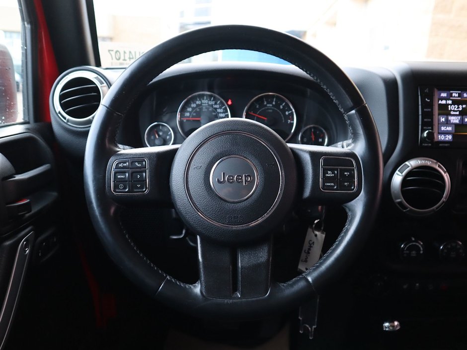 2018 Jeep WRANGLER JK UNLIMITED UNLIMITED SAHARA IN FIRECRACKER RED EQUIPPED WITH A 3.6L V6 , 4X4 , 5SPD AUTO , REMOTE START , AC , HEATED FRONT SEATS , NAV , C-26