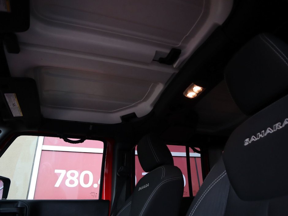 2018 Jeep WRANGLER JK UNLIMITED UNLIMITED SAHARA IN FIRECRACKER RED EQUIPPED WITH A 3.6L V6 , 4X4 , 5SPD AUTO , REMOTE START , AC , HEATED FRONT SEATS , NAV , C-18