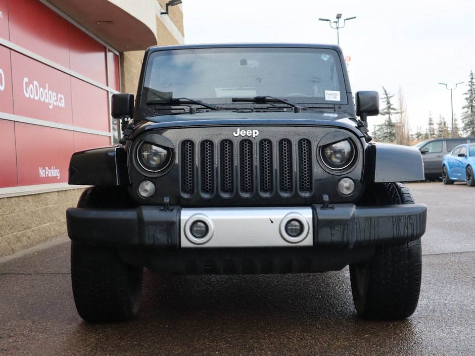 2015 Jeep Wrangler Unlimited UNLIMITED SAHARA IN BLACK EQUIPPED WITH A 3.6L V6 , 4X4 , AUTO TRANSMISSION , 18INCH RIMS , REMOTE START , NAV , HEATED FRONT SE-1