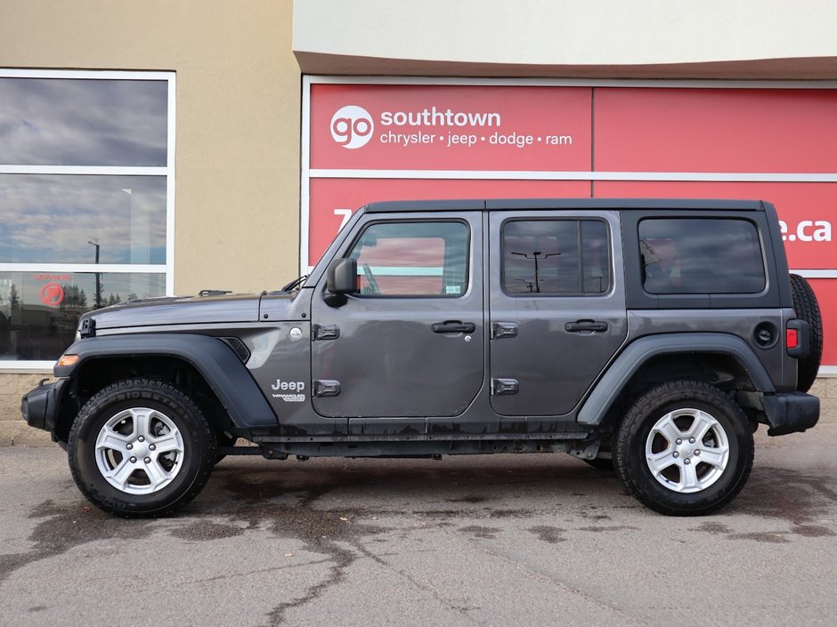 2019 Jeep Wrangler Unlimited SPORT IN GRANITE METALLIC EQUIPPED WITH A 2.0L TURBO I4 W/ETORQUE , 4X4 , 8SPD AUTO , 17INCH RIMS , ANTI SLIP DIFF REAR , COLD W-5