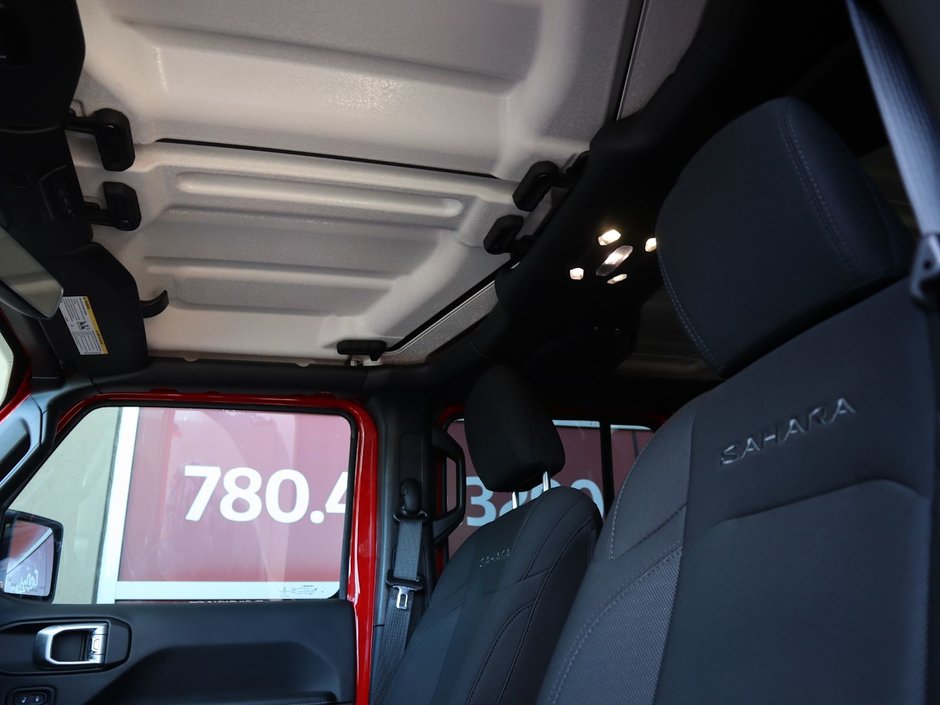 2023 Jeep Wrangler SAHARA IN FIRECRACKER RED EQUIPPED WITH A 3.6L V6 W/ETORQUE , 4X4 , 8SPD TF AUTO , HARDTOP , SIDE STEPS , LSD , LED LIGHTING , T-19