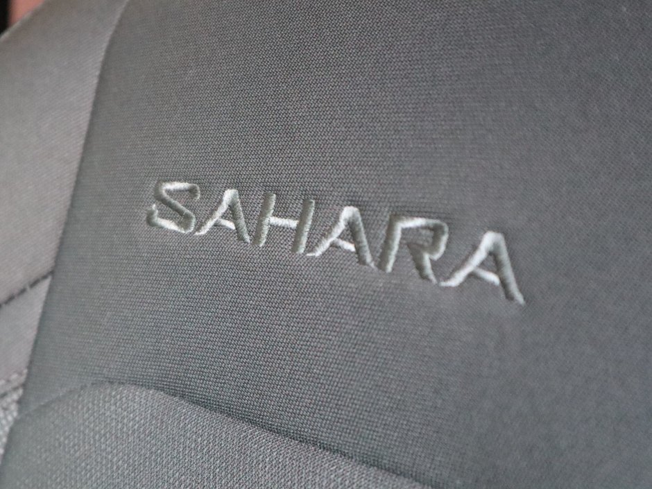 2023 Jeep Wrangler SAHARA IN FIRECRACKER RED EQUIPPED WITH A 3.6L V6 W/ETORQUE , 4X4 , 8SPD TF AUTO , HARDTOP , SIDE STEPS , LSD , LED LIGHTING , T-18