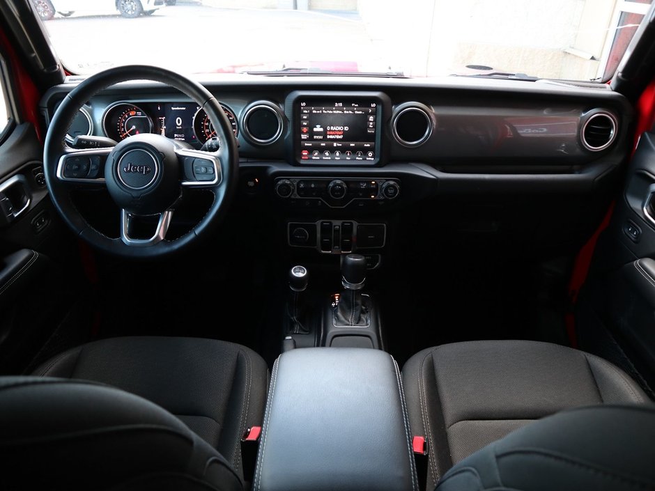 2023 Jeep Wrangler SAHARA IN FIRECRACKER RED EQUIPPED WITH A 3.6L V6 W/ETORQUE , 4X4 , 8SPD TF AUTO , HARDTOP , SIDE STEPS , LSD , LED LIGHTING , T-22