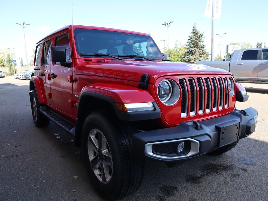 2023 Jeep Wrangler SAHARA IN FIRECRACKER RED EQUIPPED WITH A 3.6L V6 W/ETORQUE , 4X4 , 8SPD TF AUTO , HARDTOP , SIDE STEPS , LSD , LED LIGHTING , T-11