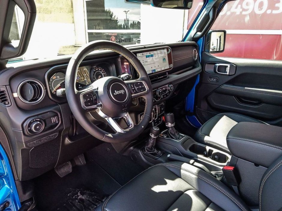 2024 Jeep Wrangler SAHARA IN HYDRO BLUE PEARL EQUIPPED WITH A 3.6L V6 , 4X4 , 8SPD TF AUTO , HARDTOP , SIDE STEPS , SAFETY GROUP , TECH GROUP , NAV-12