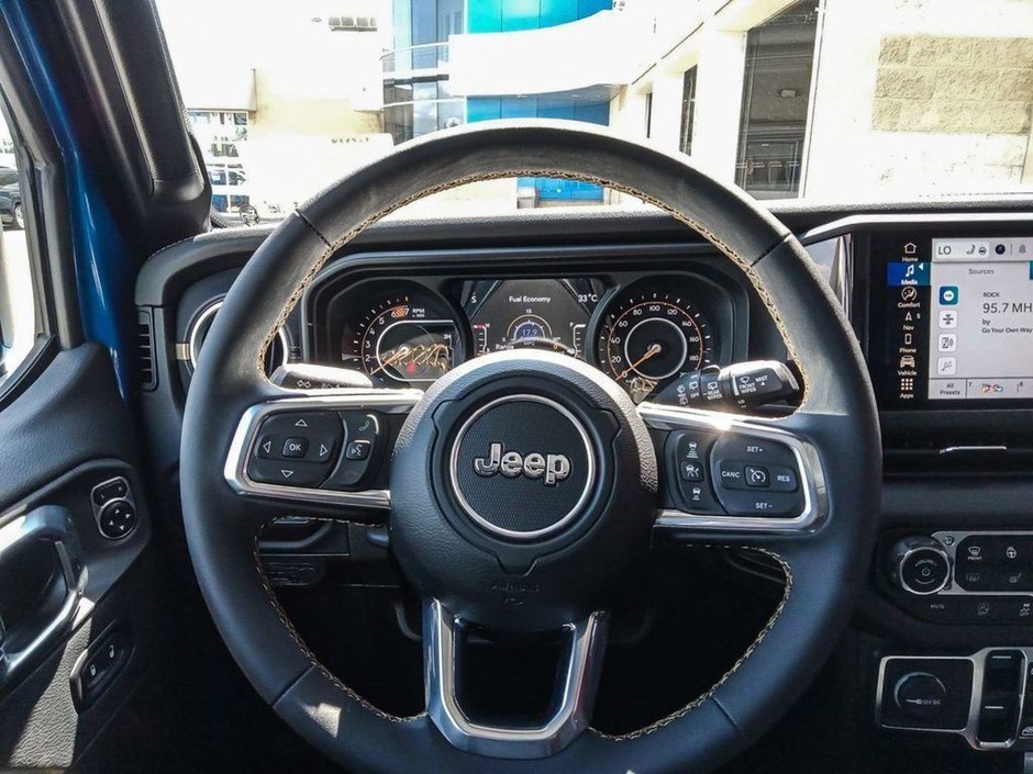 2024 Jeep Wrangler SAHARA IN HYDRO BLUE PEARL EQUIPPED WITH A 3.6L V6 , 4X4 , 8SPD TF AUTO , HARDTOP , SIDE STEPS , SAFETY GROUP , TECH GROUP , NAV-13