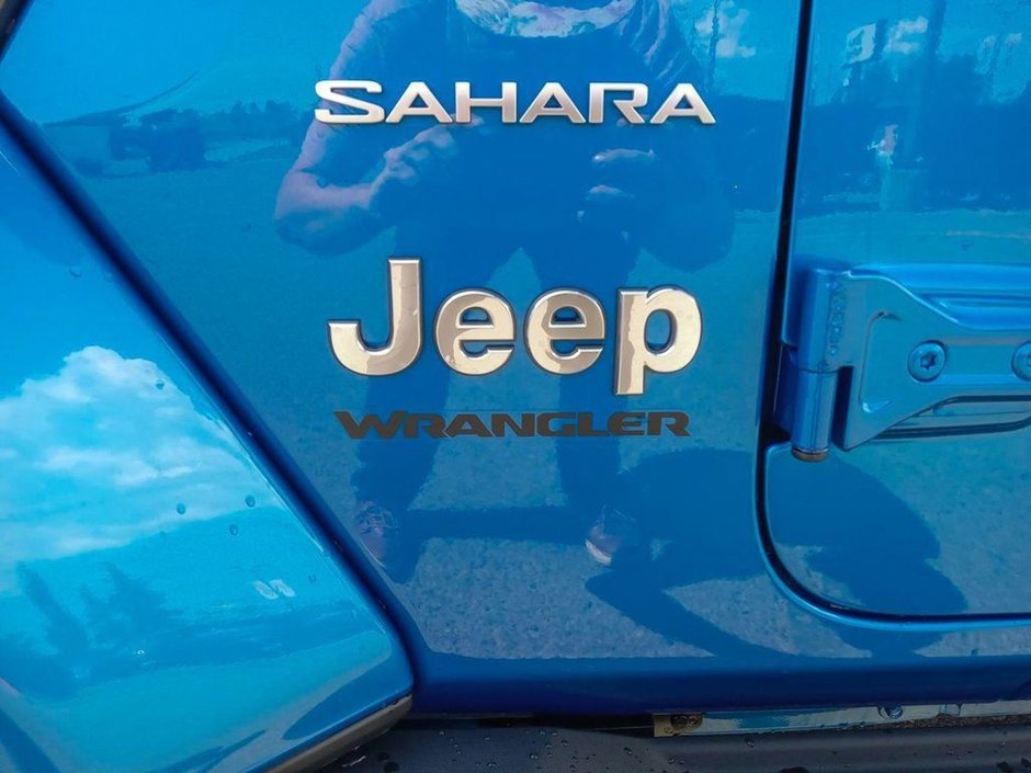 2024 Jeep Wrangler SAHARA IN HYDRO BLUE PEARL EQUIPPED WITH A 3.6L V6 , 4X4 , 8SPD TF AUTO , HARDTOP , SIDE STEPS , SAFETY GROUP , TECH GROUP , NAV-8