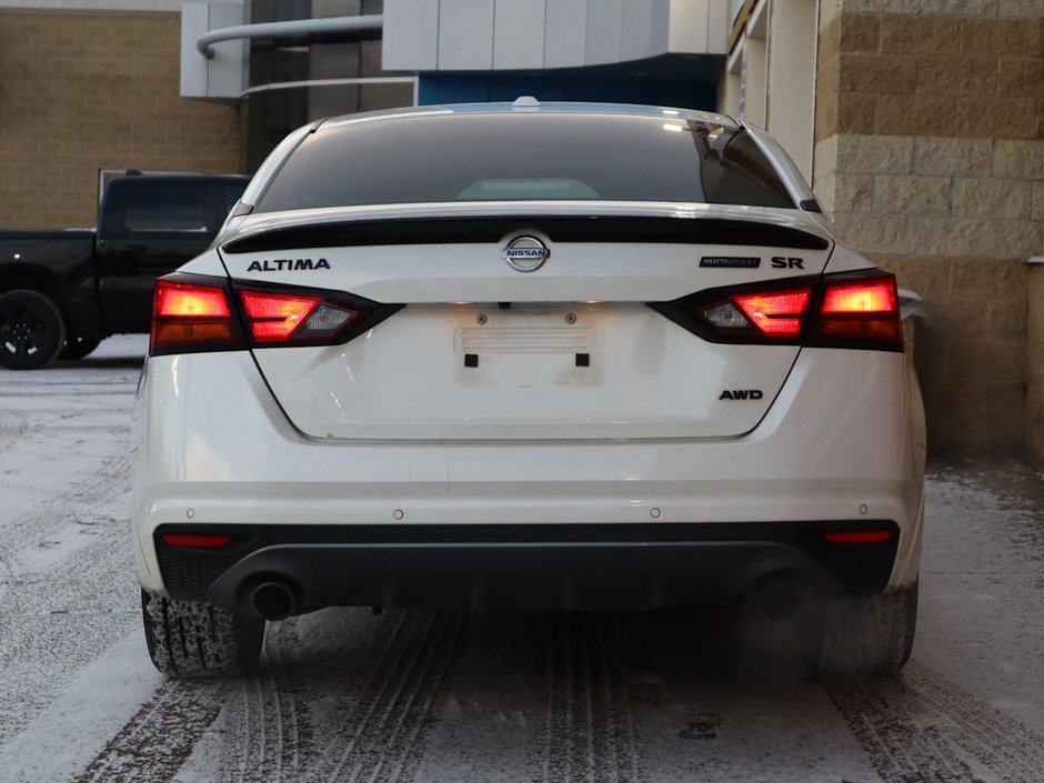 2022 Nissan Altima SR MIDNIGHT EDITION IN WHITE EQUIPPED WITH A 2.5L I4 , AWD , CVT AUTO , BLACK RIMS , PWR SUNROOF , DUAL EXHAUST , LEATHER HEATED-8