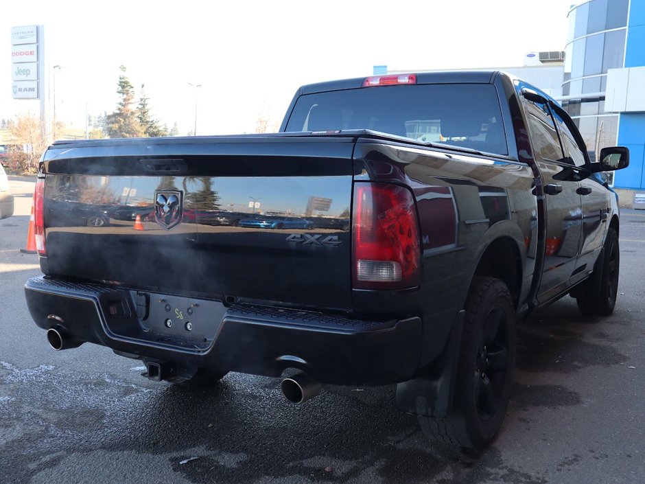 2021 Ram 1500 Classic CLASSIC EXPRESS IN DIAMOND BLACK EQUIPPED WITH A 5.7L HEMI V8 , 4X4 , 8SPD TF AUTO , SPORT HOOD , WHEEL & SOUND GROUP , BLACK AC-9