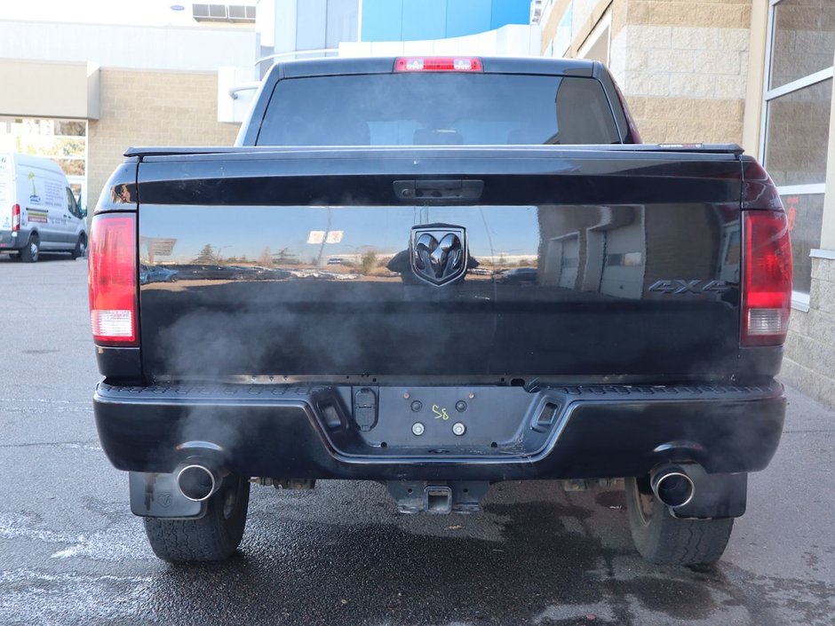 2021 Ram 1500 Classic CLASSIC EXPRESS IN DIAMOND BLACK EQUIPPED WITH A 5.7L HEMI V8 , 4X4 , 8SPD TF AUTO , SPORT HOOD , WHEEL & SOUND GROUP , BLACK AC-8