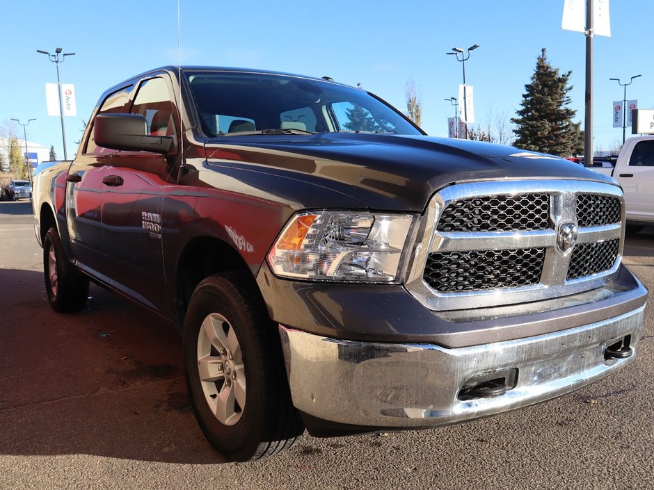 2023 Ram 1500 Classic SLT IN GRANITE METALLIC EQUIPPED WITH A 3.6L V6 , 4X4 , 8SPD AUTO , PROTECTION GROUP , PWR DRIVER SEAT , PREMIUM CLOTH BENCH SEA-10