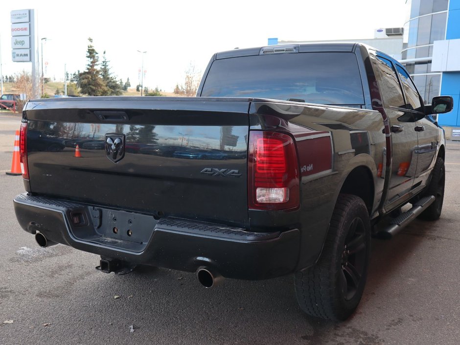 2017 Ram 1500 SPORT IN BRILLIANT BLACK EQUIPPED WITH A 5.7L HEMI V8 , 4X4 , 8SPD TF AUTO , BACKUP CAM , 121L TANK , SUNROOF , BLACK PCKG , 20I-9