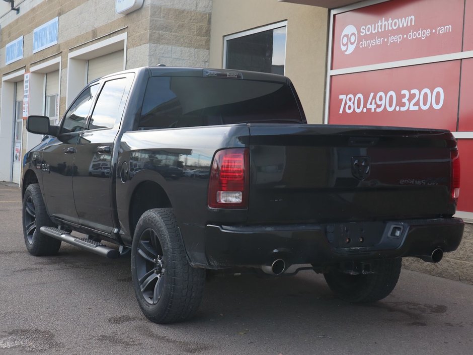 2017 Ram 1500 SPORT IN BRILLIANT BLACK EQUIPPED WITH A 5.7L HEMI V8 , 4X4 , 8SPD TF AUTO , BACKUP CAM , 121L TANK , SUNROOF , BLACK PCKG , 20I-7