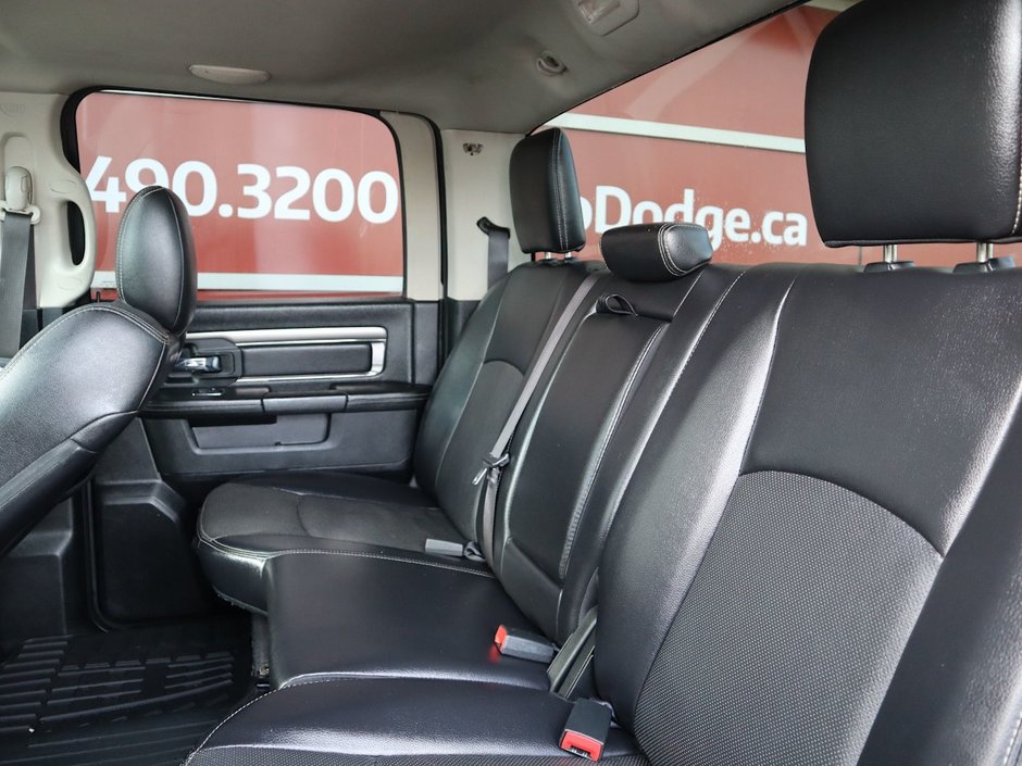 2017 Ram 1500 SPORT IN BRILLIANT BLACK EQUIPPED WITH A 5.7L HEMI V8 , 4X4 , 8SPD TF AUTO , BACKUP CAM , 121L TANK , SUNROOF , BLACK PCKG , 20I-20