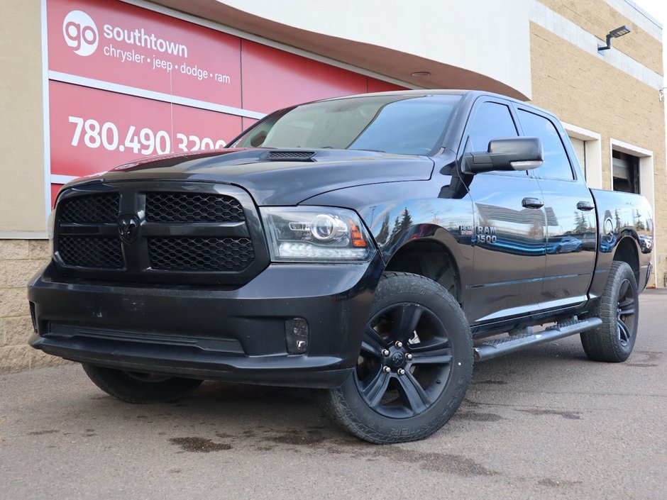 2017 Ram 1500 SPORT IN BRILLIANT BLACK EQUIPPED WITH A 5.7L HEMI V8 , 4X4 , 8SPD TF AUTO , BACKUP CAM , 121L TANK , SUNROOF , BLACK PCKG , 20I-0