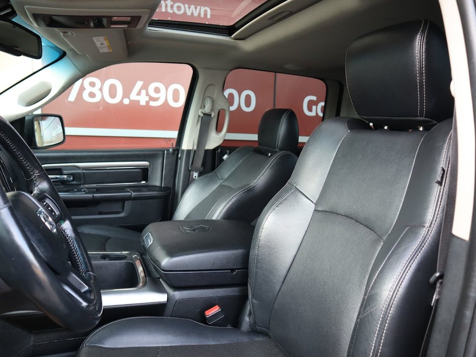 2017 Ram 1500 SPORT IN BRILLIANT BLACK EQUIPPED WITH A 5.7L HEMI V8 , 4X4 , 8SPD TF AUTO , BACKUP CAM , 121L TANK , SUNROOF , BLACK PCKG , 20I-16