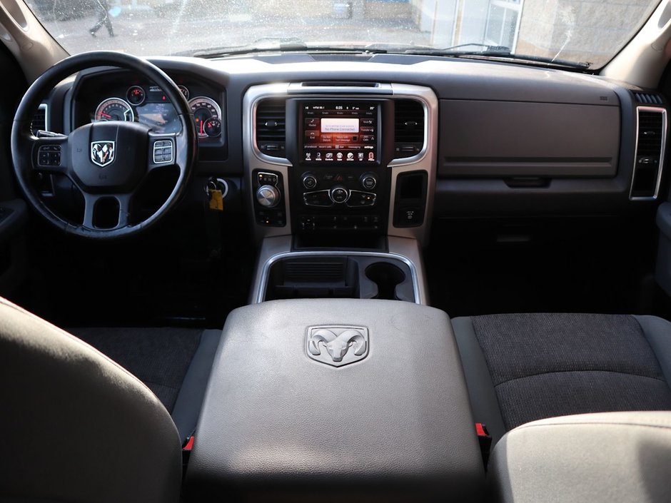 2017 Ram 1500 BIG HORN IN RED PEARL EQUIPPED WITH A 5.7L HEMI V8 , 4X4 , 8SPD TF AUTO , DUAL ZONE AC , 121L TANK , BACKUP CAM , PARK SENSE , R-22