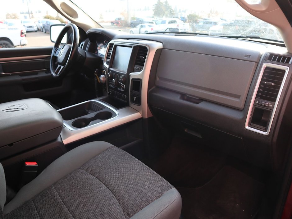 2017 Ram 1500 BIG HORN IN RED PEARL EQUIPPED WITH A 5.7L HEMI V8 , 4X4 , 8SPD TF AUTO , DUAL ZONE AC , 121L TANK , BACKUP CAM , PARK SENSE , R-21