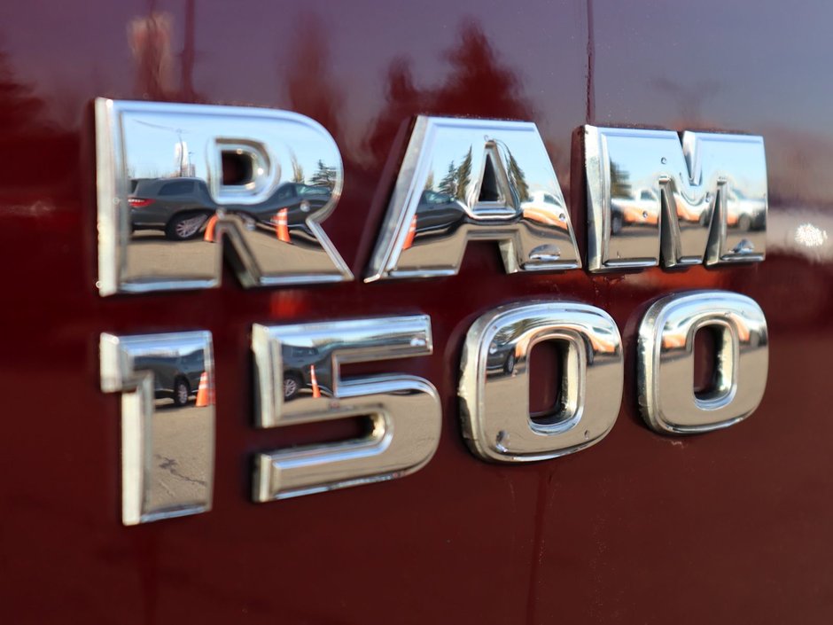 2017 Ram 1500 BIG HORN IN RED PEARL EQUIPPED WITH A 5.7L HEMI V8 , 4X4 , 8SPD TF AUTO , DUAL ZONE AC , 121L TANK , BACKUP CAM , PARK SENSE , R-11