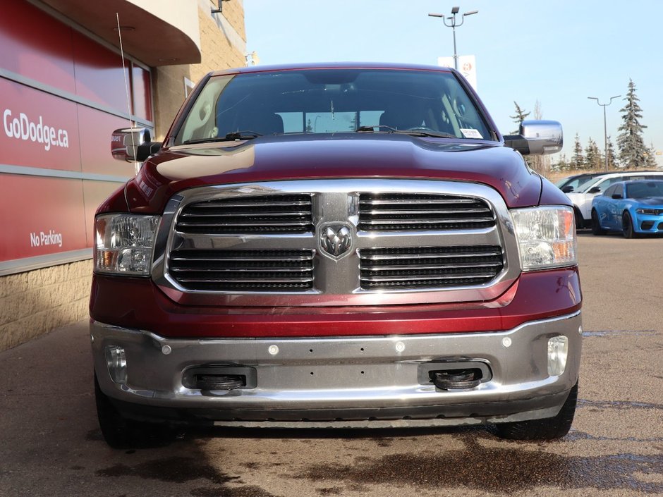 2017 Ram 1500 BIG HORN IN RED PEARL EQUIPPED WITH A 5.7L HEMI V8 , 4X4 , 8SPD TF AUTO , DUAL ZONE AC , 121L TANK , BACKUP CAM , PARK SENSE , R-1