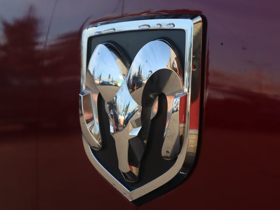 2017 Ram 1500 BIG HORN IN RED PEARL EQUIPPED WITH A 5.7L HEMI V8 , 4X4 , 8SPD TF AUTO , DUAL ZONE AC , 121L TANK , BACKUP CAM , PARK SENSE , R-13