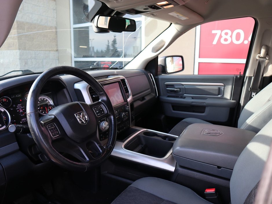 2017 Ram 1500 BIG HORN IN RED PEARL EQUIPPED WITH A 5.7L HEMI V8 , 4X4 , 8SPD TF AUTO , DUAL ZONE AC , 121L TANK , BACKUP CAM , PARK SENSE , R-16