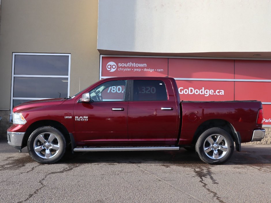 2017 Ram 1500 BIG HORN IN RED PEARL EQUIPPED WITH A 5.7L HEMI V8 , 4X4 , 8SPD TF AUTO , DUAL ZONE AC , 121L TANK , BACKUP CAM , PARK SENSE , R-6