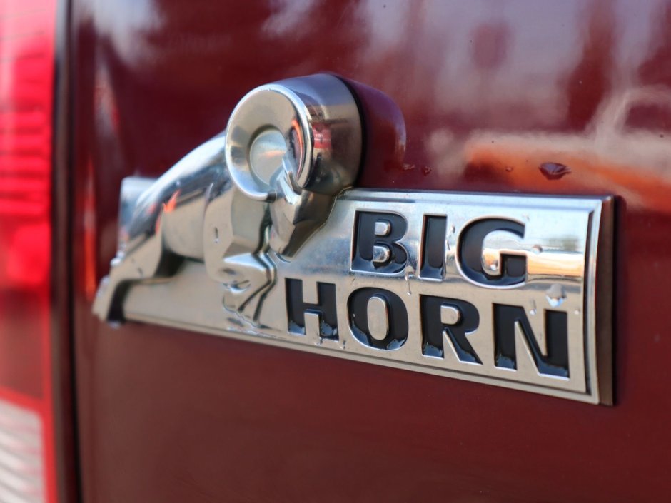 2017 Ram 1500 BIG HORN IN RED PEARL EQUIPPED WITH A 5.7L HEMI V8 , 4X4 , 8SPD TF AUTO , DUAL ZONE AC , 121L TANK , BACKUP CAM , PARK SENSE , R-14