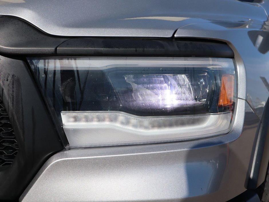 2021 Ram 1500 REBEL IN BILLET SILVER EQUIPPED WITH A 3.0L TURBO DIESEL V6 , 8SPD AUTO , 4X4 , LVL 1 EQUIPMENT GROUP , COLD WEATHER GROUP , 8.4-3