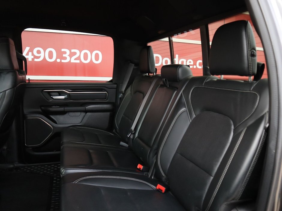 2022 Ram 1500 SPORT IN GRANITE METALLIC EQUIPPED WITH A 5.7L HEMI V8 , 4X4 , 8SPD AUTO , SPORT HOOD , SIDE STEPS , TRI FOLD TONNEAU , LVL 2 EQ-21