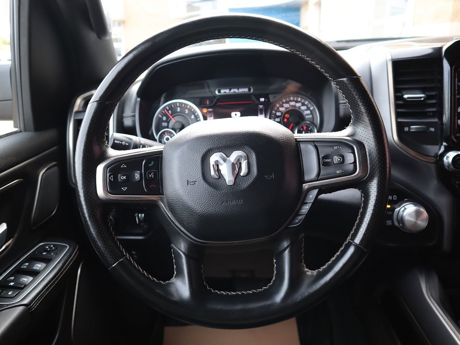 2022 Ram 1500 SPORT IN GRANITE METALLIC EQUIPPED WITH A 5.7L HEMI V8 , 4X4 , 8SPD AUTO , SPORT HOOD , SIDE STEPS , TRI FOLD TONNEAU , LVL 2 EQ-26