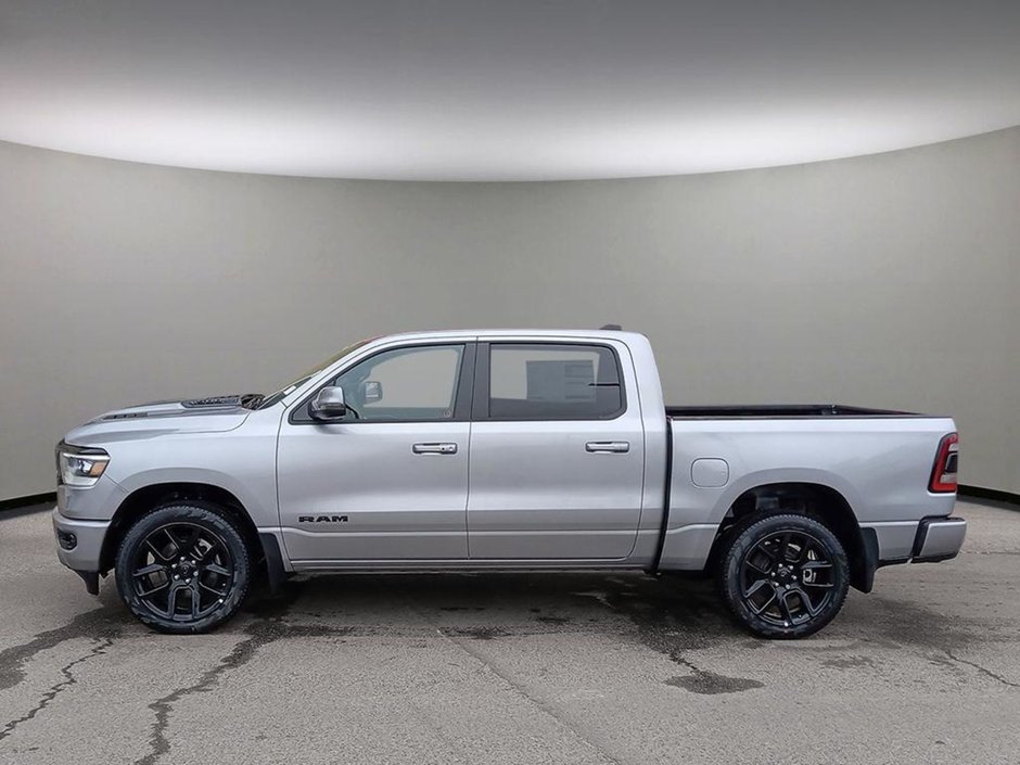 2024 Ram 1500 SPORT NIGHT EDITION IN BILLET SILVER EQUIPPED WITH A 5.7L HEMI V8 W/ETORQUE , 4X4 , 8SPD AUTO , BSM/RCPD , 125L TANK , SPORT HOO-2