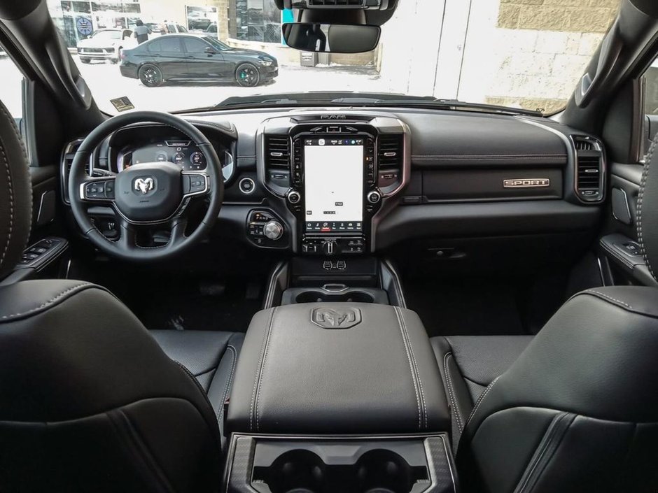 2024 Ram 1500 SPORT IN DIAMOND BLACK EQUIPPED WITH A 5.7L HEMI V8 W/ETORQUE , 4X4 , 8SPD AUTO , 125L TANK , SPORT HOOD , PANORAMIC SUNROOF , R-22